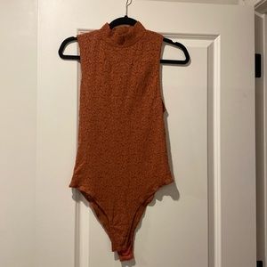 Mock neck lace bodysuit